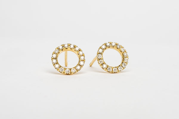 These circle studs are great to make a cool statement. There cute and funky. You can dress it up, you can wear it casually and you can match with the circle bracelet for a nice set of jewellery.   18kt yellow gold