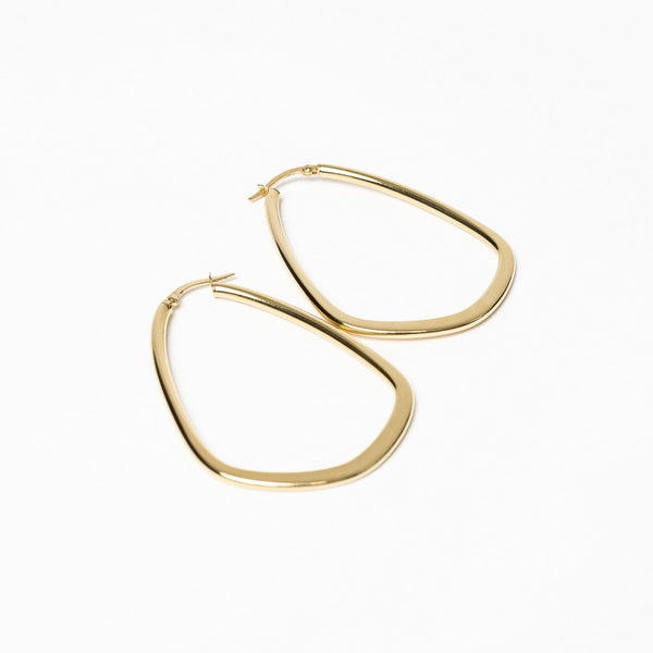 These stunning hoops are eyecatchers. The organic shapes make them real showstoppers.   The earrings are made out of 18kt yellow gold, they will last forever. 