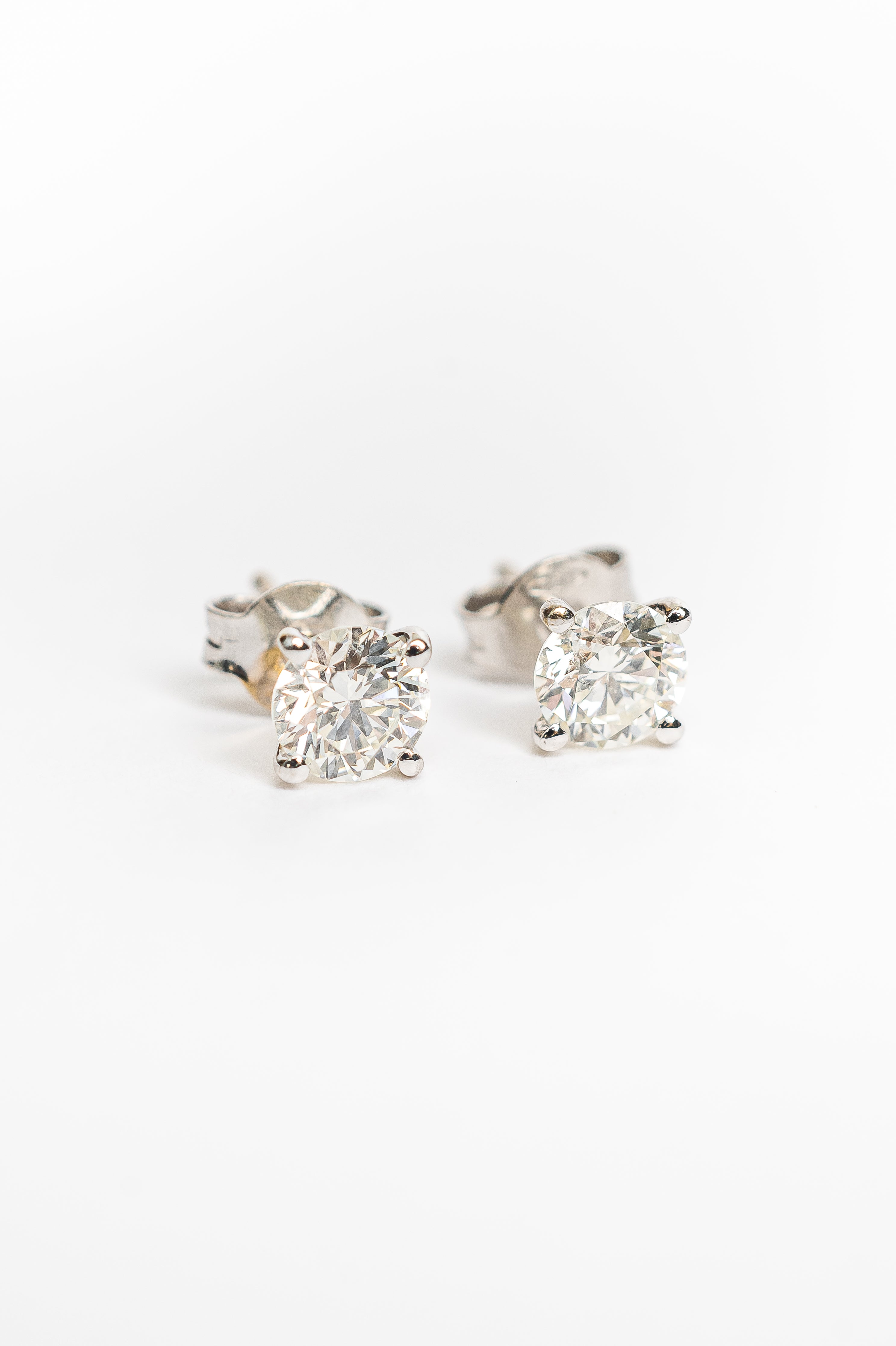 These round diamond studs is the most timeless and classy piece one can own. It's perfect in its simplicity.  We can create this custom piece with a beautiful diamond according your budget and specifications. (clarity, cut, carat and color)   If you are interested in this design with beautiful diamonds or a colorful gemstone, please contact our bespoke team and start designing. 