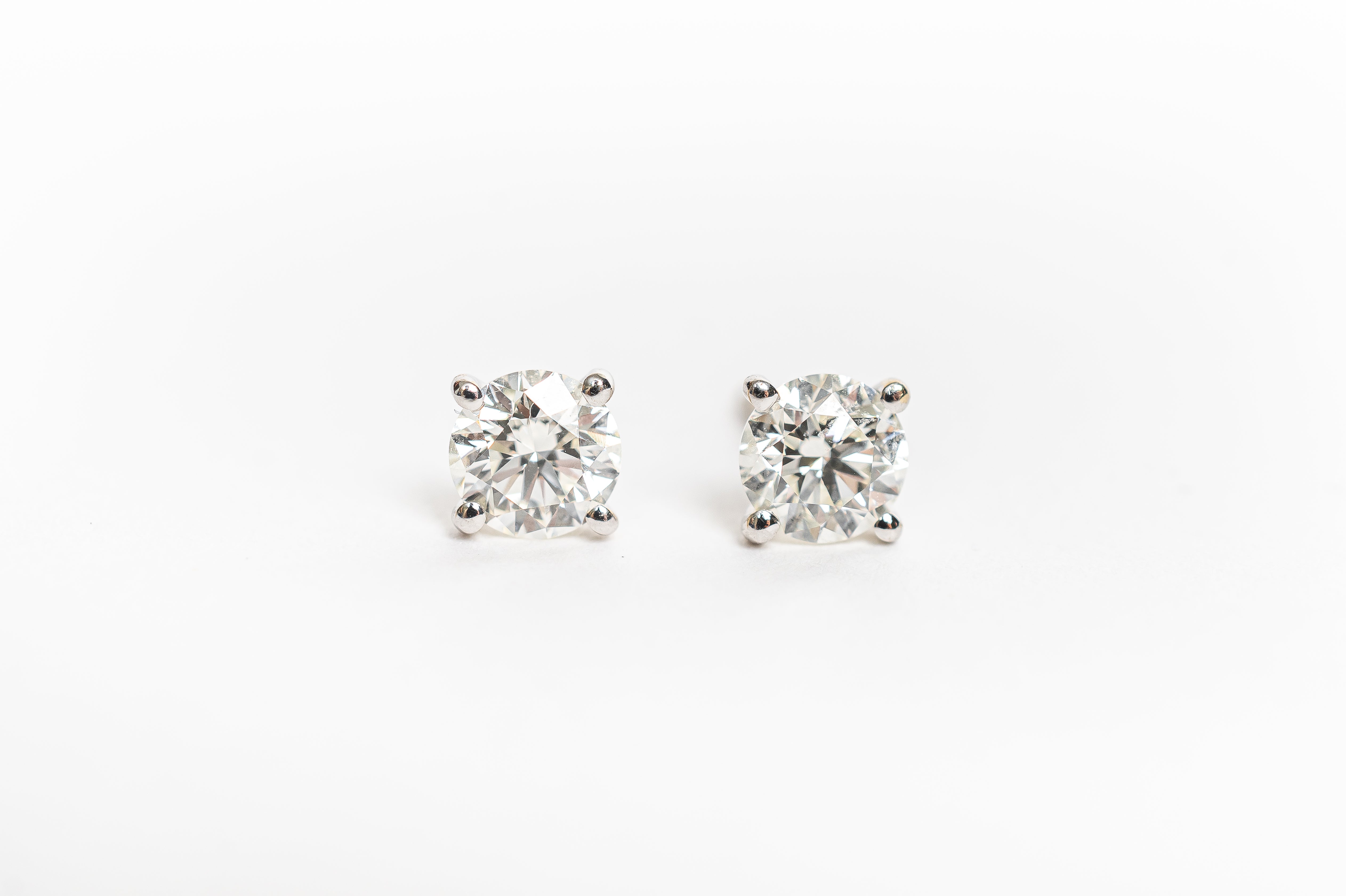 These round diamond studs is the most timeless and classy piece one can own. It's perfect in its simplicity.  We can create this custom piece with a beautiful diamond according your budget and specifications. (clarity, cut, carat and color)   If you are interested in this design with beautiful diamonds or a colorful gemstone, please contact our bespoke team and start designing. 