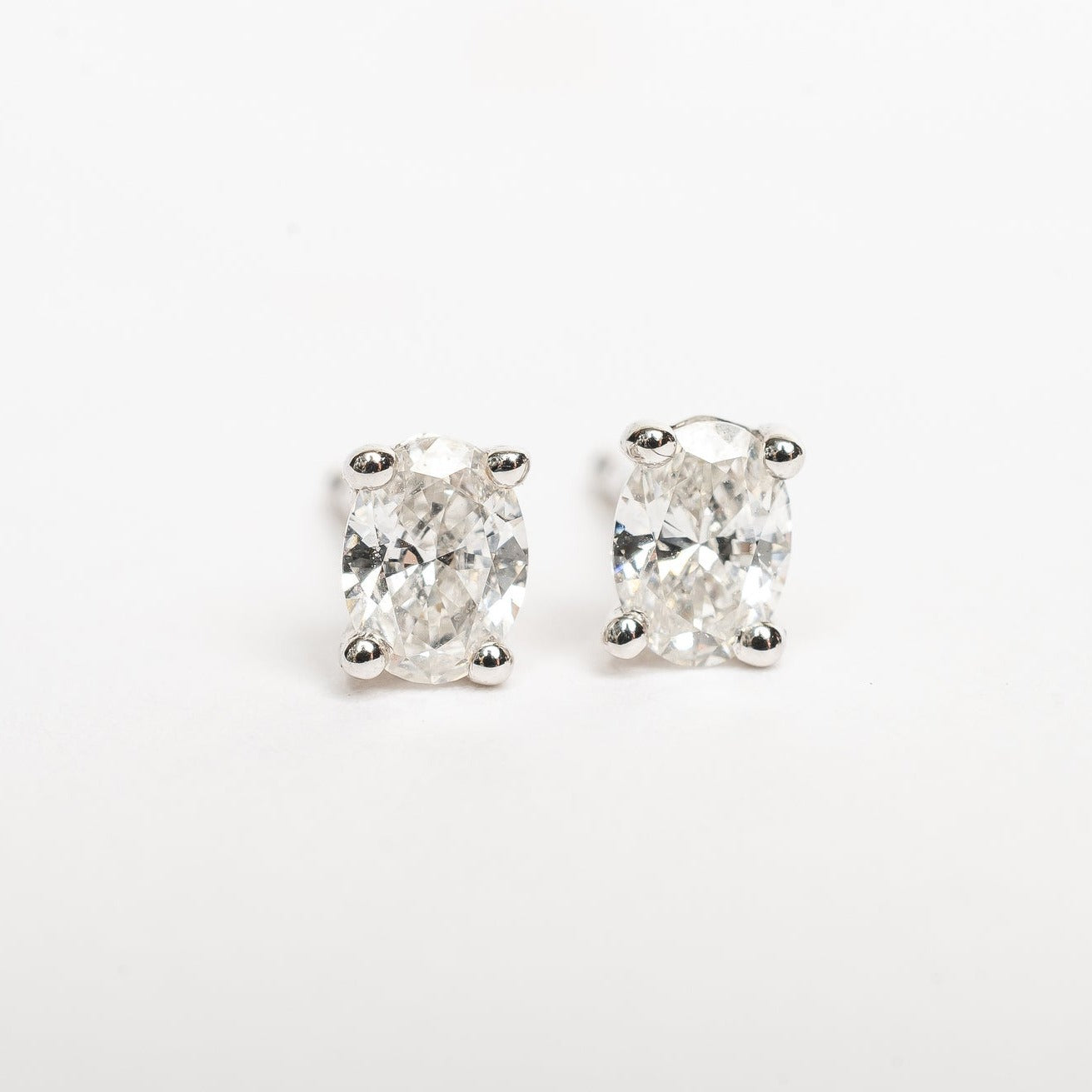 These beautiful oval diamond studs compliment your look. Many will buy these studs as a first diamond pair earrings. Some will go for round but these are oval shaped which makes it more special.   These studs are also cool to combine with an extra piercing. People will notice these diamond beauties. 