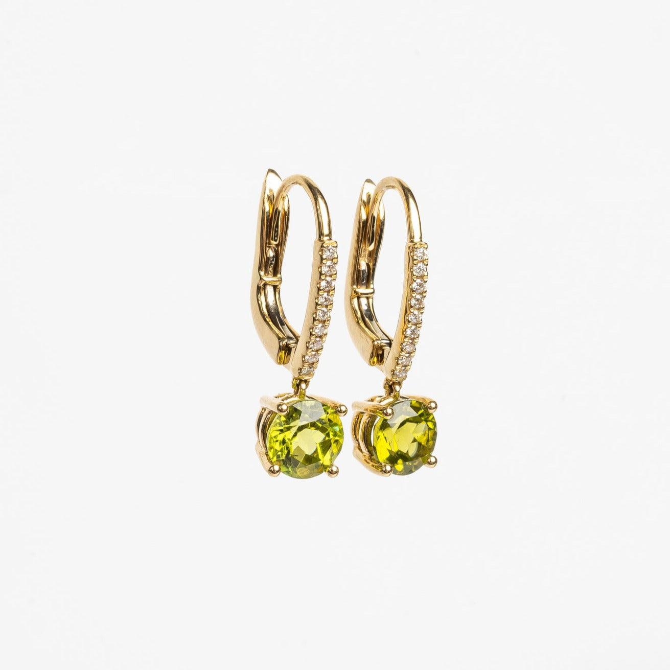 Beautiful green earrings, matching your modern outfits. The green compliments most when you have brown or greenish eyes. These earrings are so beautiful, they won't stay unnoticed. 