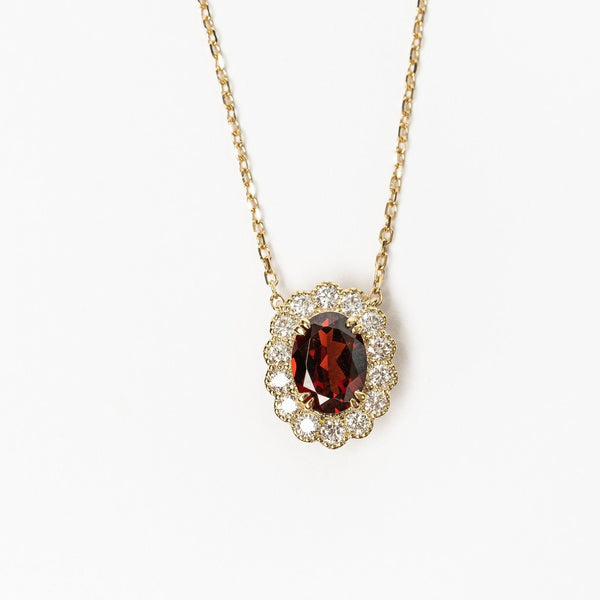 This elegant necklace is set with beautiful natural diamonds and with an oval cut red garnet. The necklace is made from 18kt rose gold.  From this gorgeous style we have created a matching ring and earrings. You can find them in our webshop when you filter on red garnet or colored gemstone styles. 