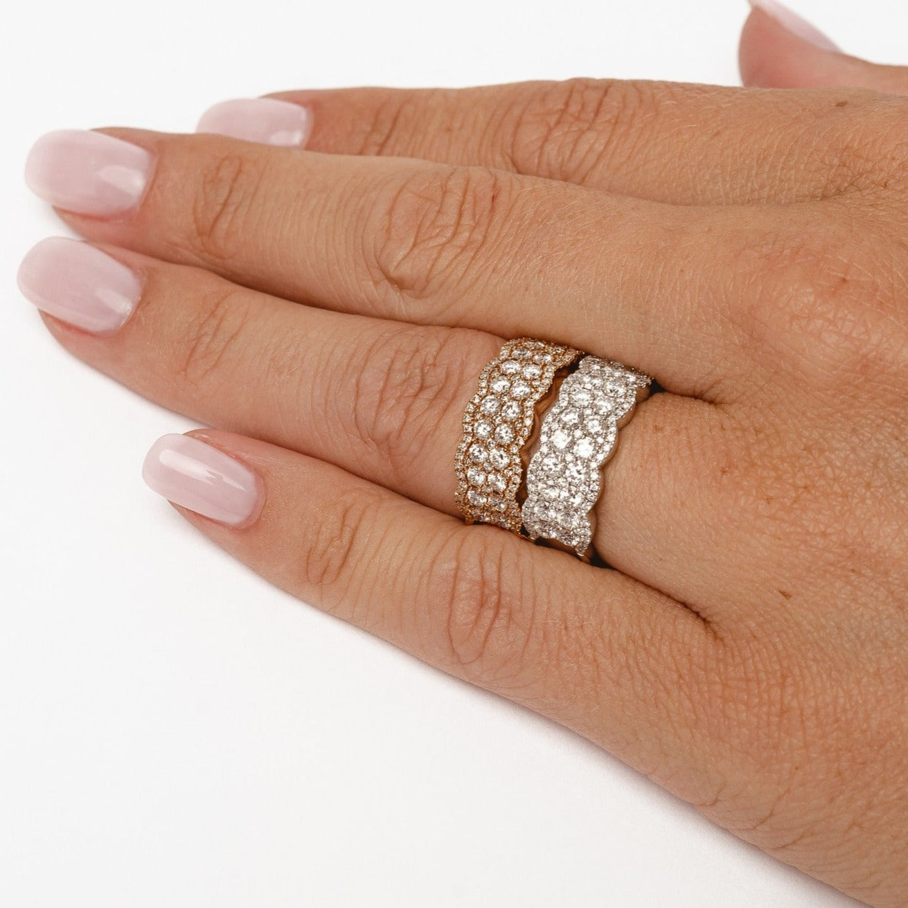 The royal ring! This royal and impressive ring is a little wider than others and therefore impressive made with 18kt gold and all natural diamonds. This ring gives you a perfect finger coverage and could also be worn on any other finger than your ring finger. It's a fun and beautiful design. 