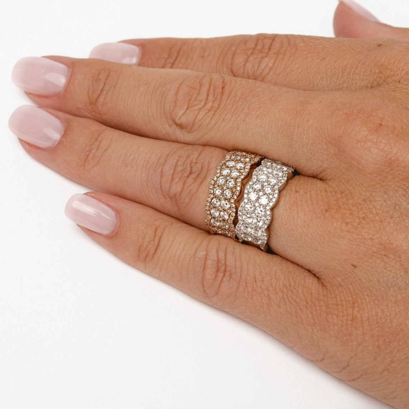 The royal ring! This royal and impressive ring is a little wider than others and therefore impressive made with 18kt gold and all natural diamonds. This ring gives you a perfect finger coverage and could also be worn on any other finger than your ring finger. It's a fun and beautiful design. 