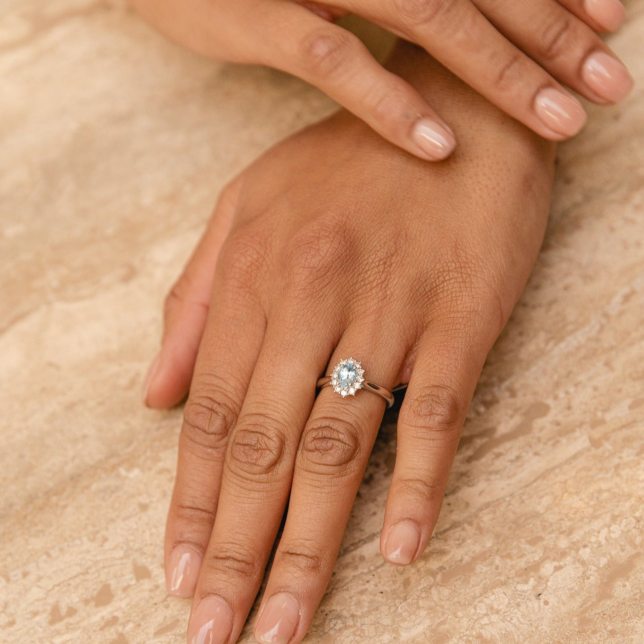 This gorgeous green Peridot vintage ring is set to perfection. The center Peridot is a true showstopper surrounded by beautiful diamonds. This ring will remind you of the engagement ring of Diana with a modern twist. 